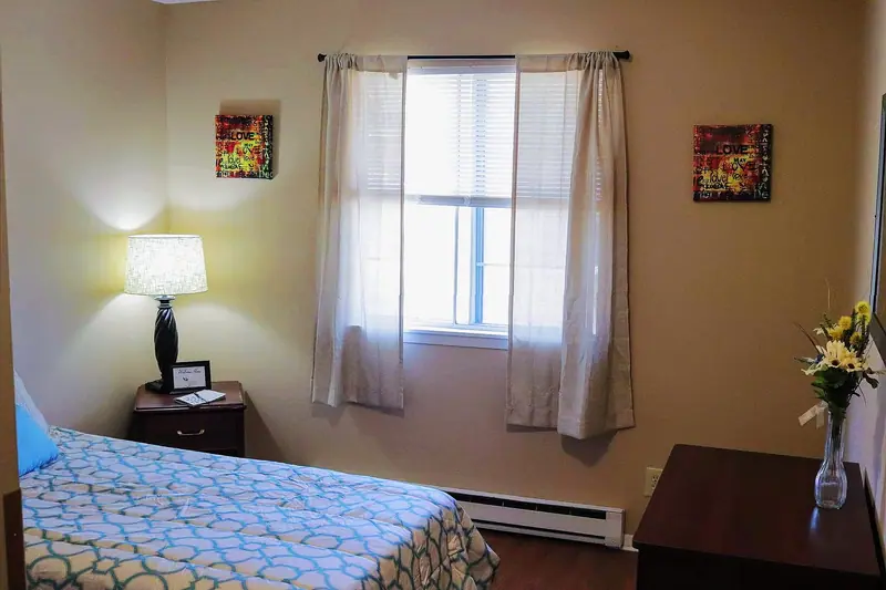 Senior living resident bedroom at Adava Care Fardale in Milwaukee, WI