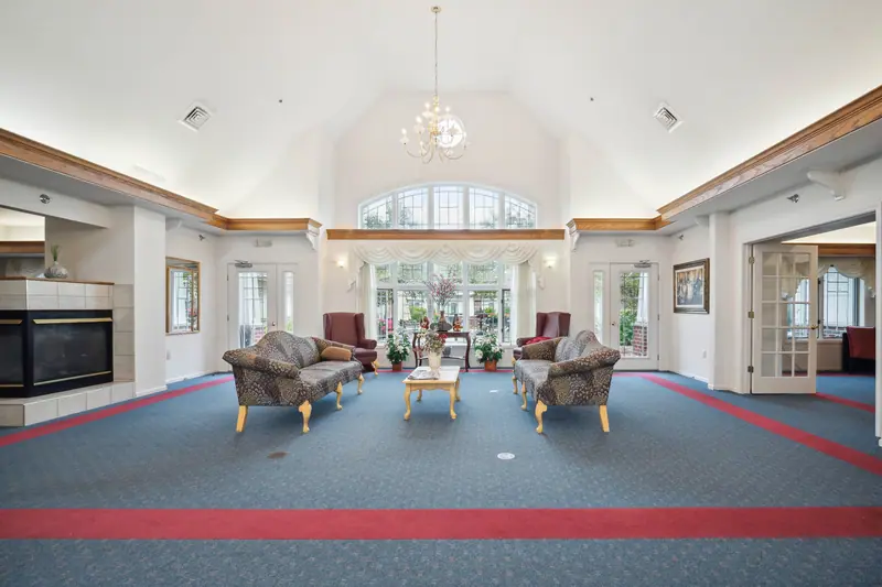 Grand lobby with vaulted ceilings at Adava Care Pewaukee senior living in Pewaukee, WI
