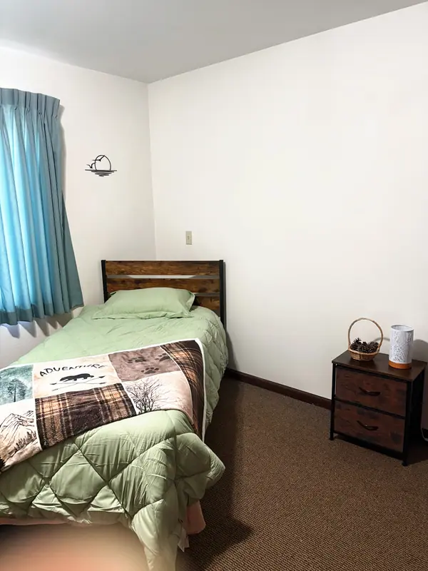 Senior living resident bedroom at Adava Care St. Francis in St. Francis, WI